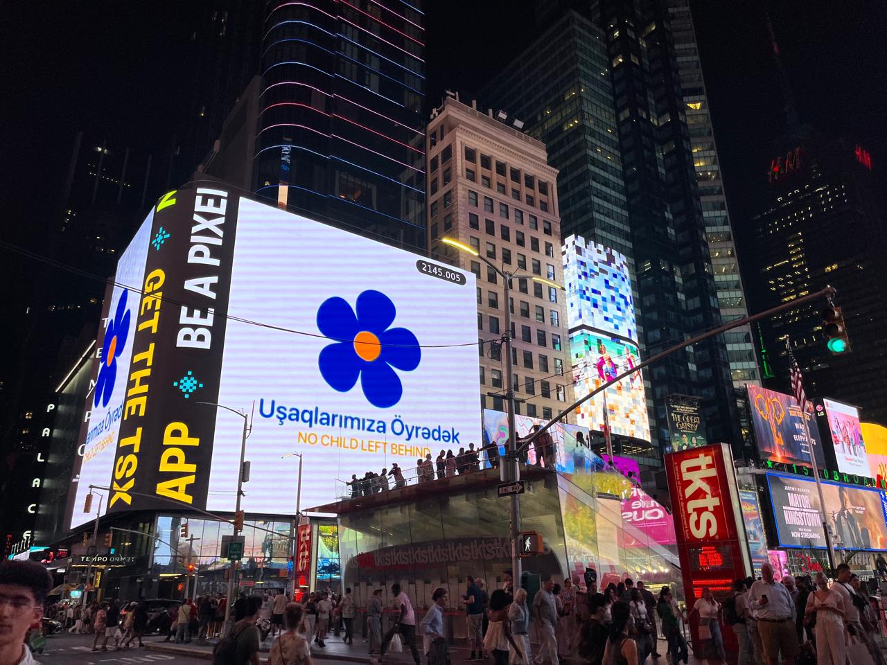Uşaqlarımıza Öyrədək featured at New York Times Square.